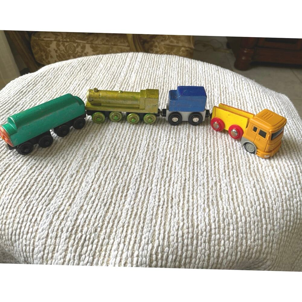 magnetic wooden train set appears compatible with brands Brio and Melissa & Doug